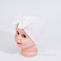 Children's winter knitted beanie with big bow